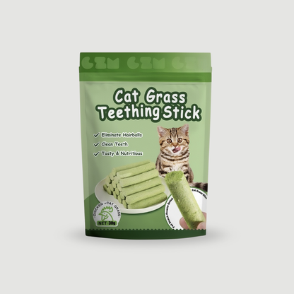 Green package of cat grass teething sticks with a cat on the label